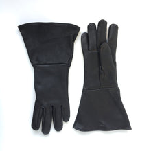 Load image into Gallery viewer, A pair of deerskin gauntlets top view showing extended cuff black leather