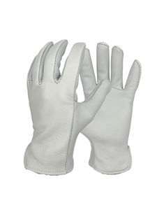 A man wearing a pair of white goatskin leather gloves made in Bend Oregon USA