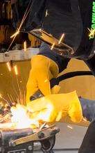 Load image into Gallery viewer, A man welding wearing Elkskin leather gloves made in the USA